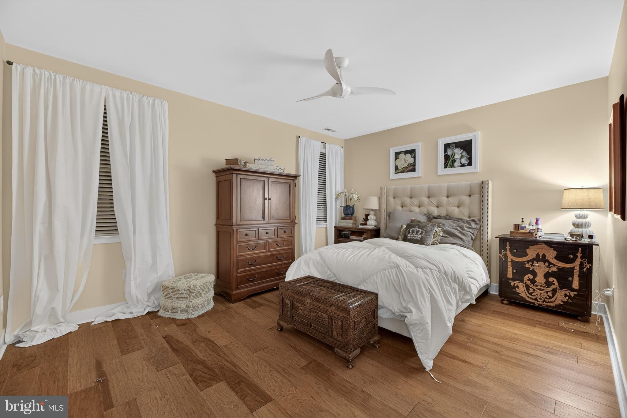 35 Saratoga Road New Egypt, NJ 08533 - Photo 26 of 52 a bedroom with a large bed and a chandelier