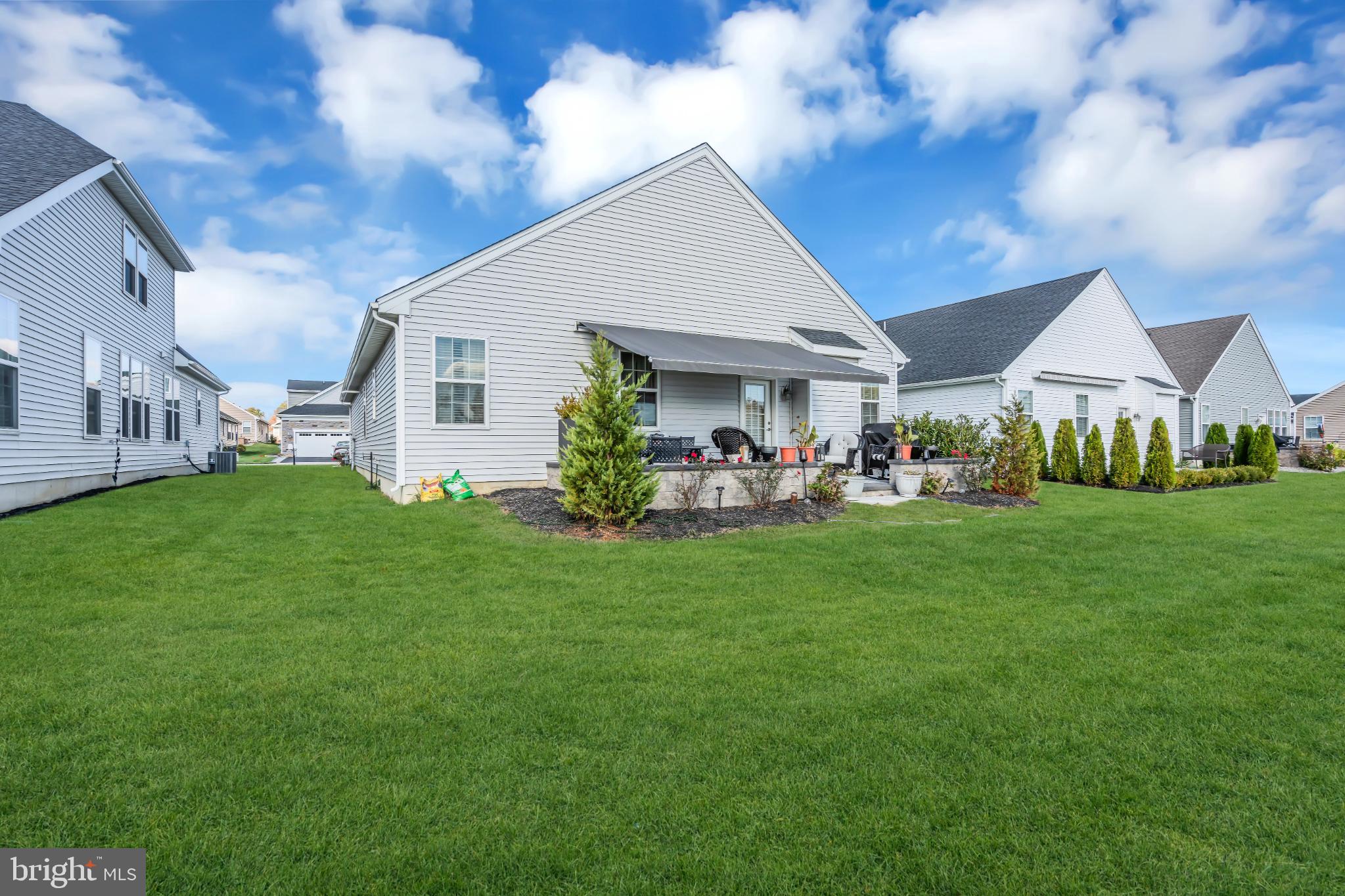35 Saratoga Road New Egypt, NJ 08533 - Photo 4 of 52 a front view of house with yard and outdoor seating