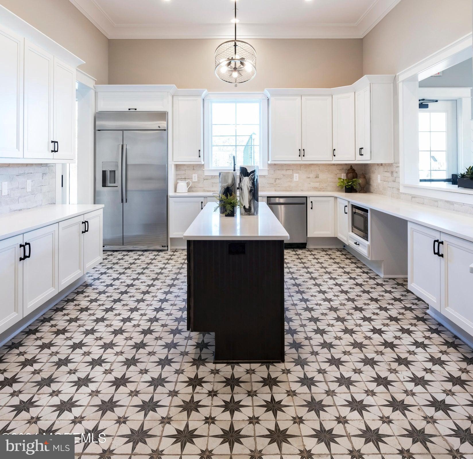 35 Saratoga Road New Egypt, NJ 08533 - Photo 51 of 52 a kitchen with a sink a stove cabinets and a window