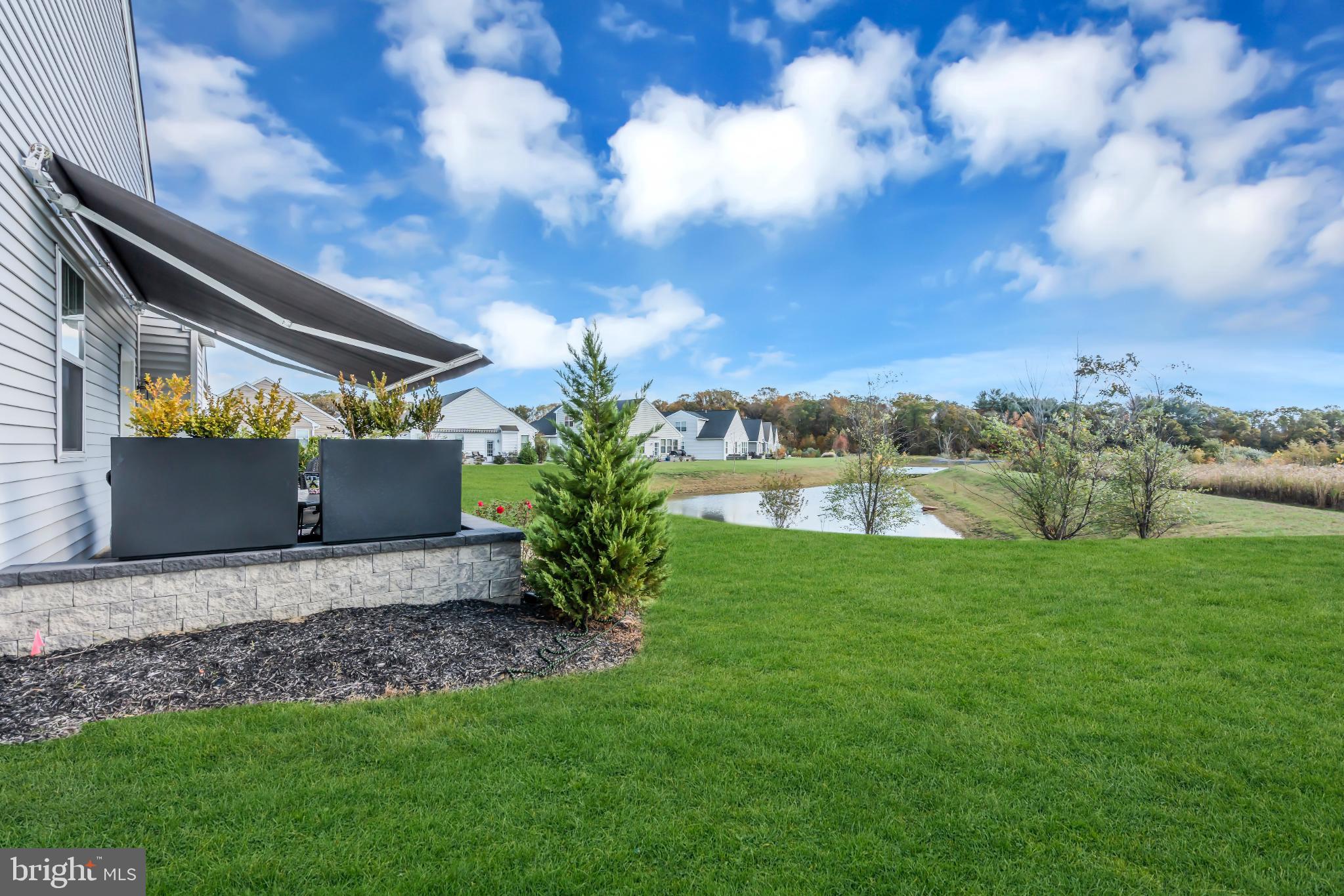 35 Saratoga Road New Egypt, NJ 08533 - Photo 8 of 52 a backyard of a house with lots of green space