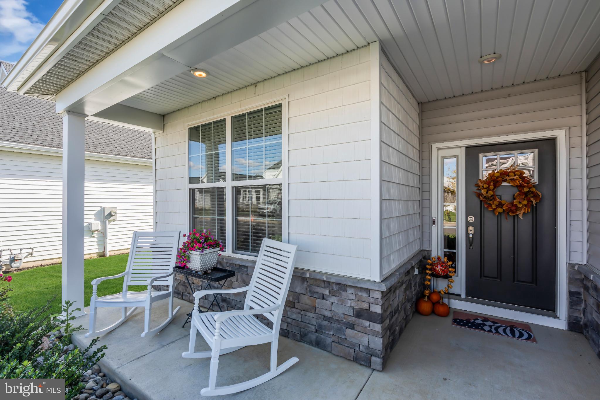 35 Saratoga Road New Egypt, NJ 08533 - Photo 9 of 52 a view of a porch with chairs and backyard