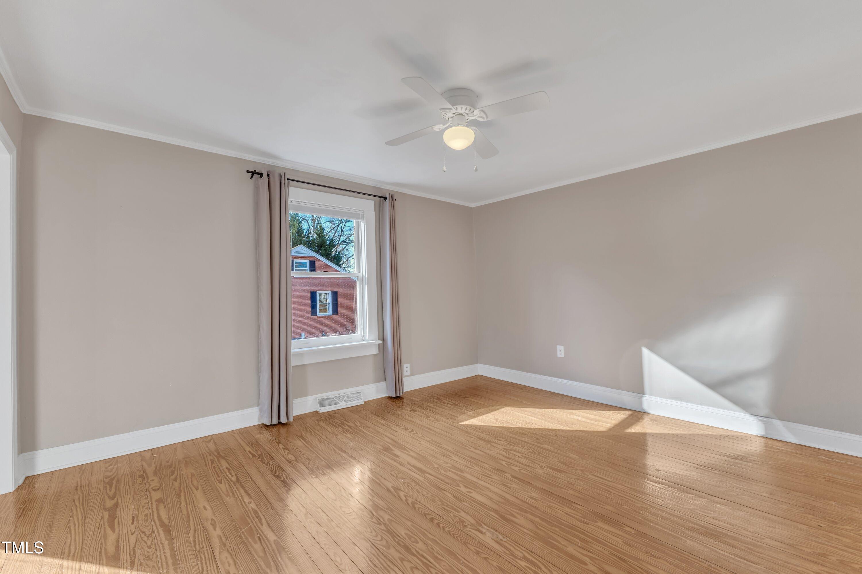 152 East Tryon Street Hillsborough, NC 27278 - Photo 18 of 34 a view of empty room with wooden floor