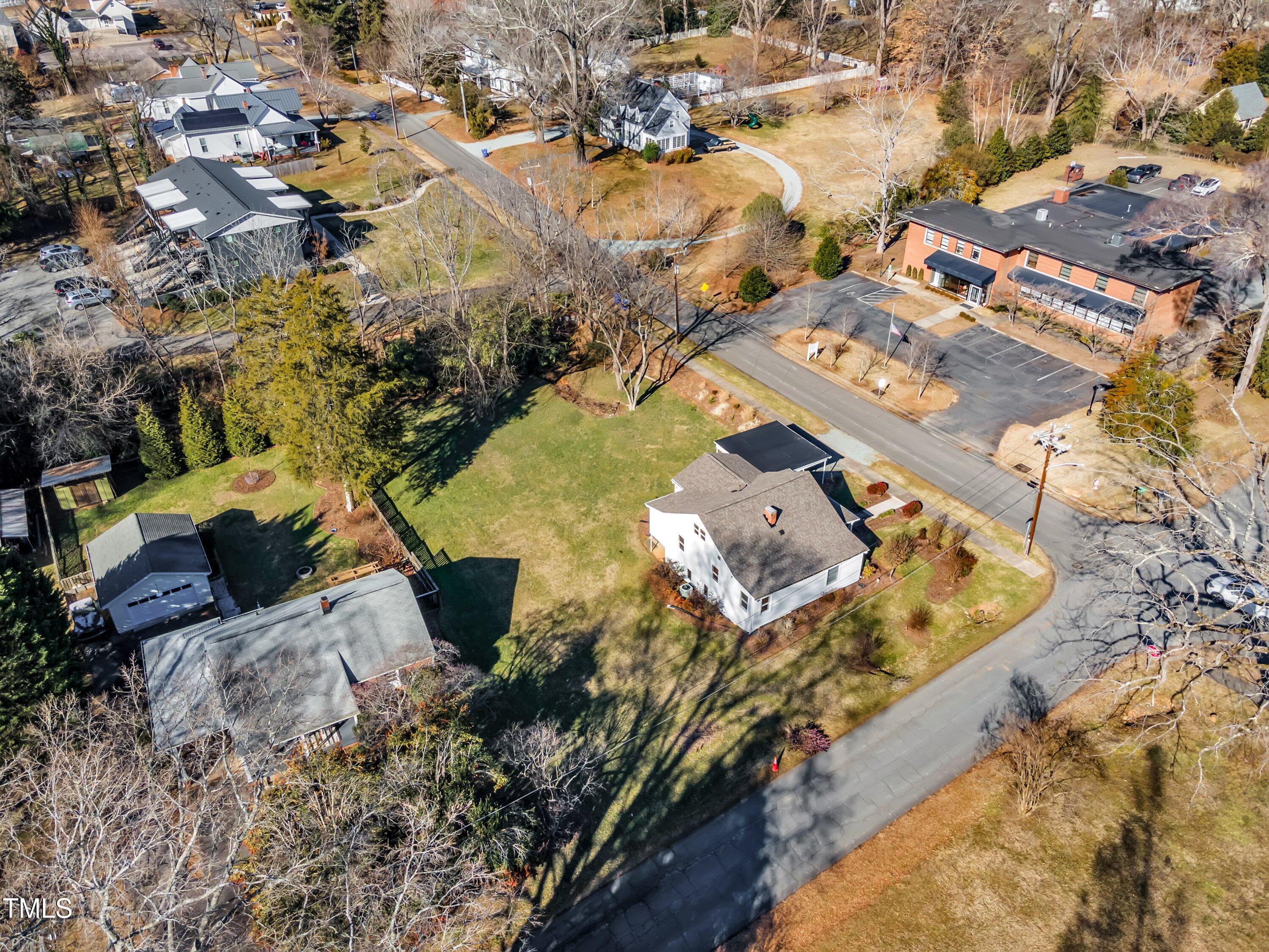 152 East Tryon Street Hillsborough, NC 27278 - Photo 31 of 34 an aerial view of residential houses with outdoor space