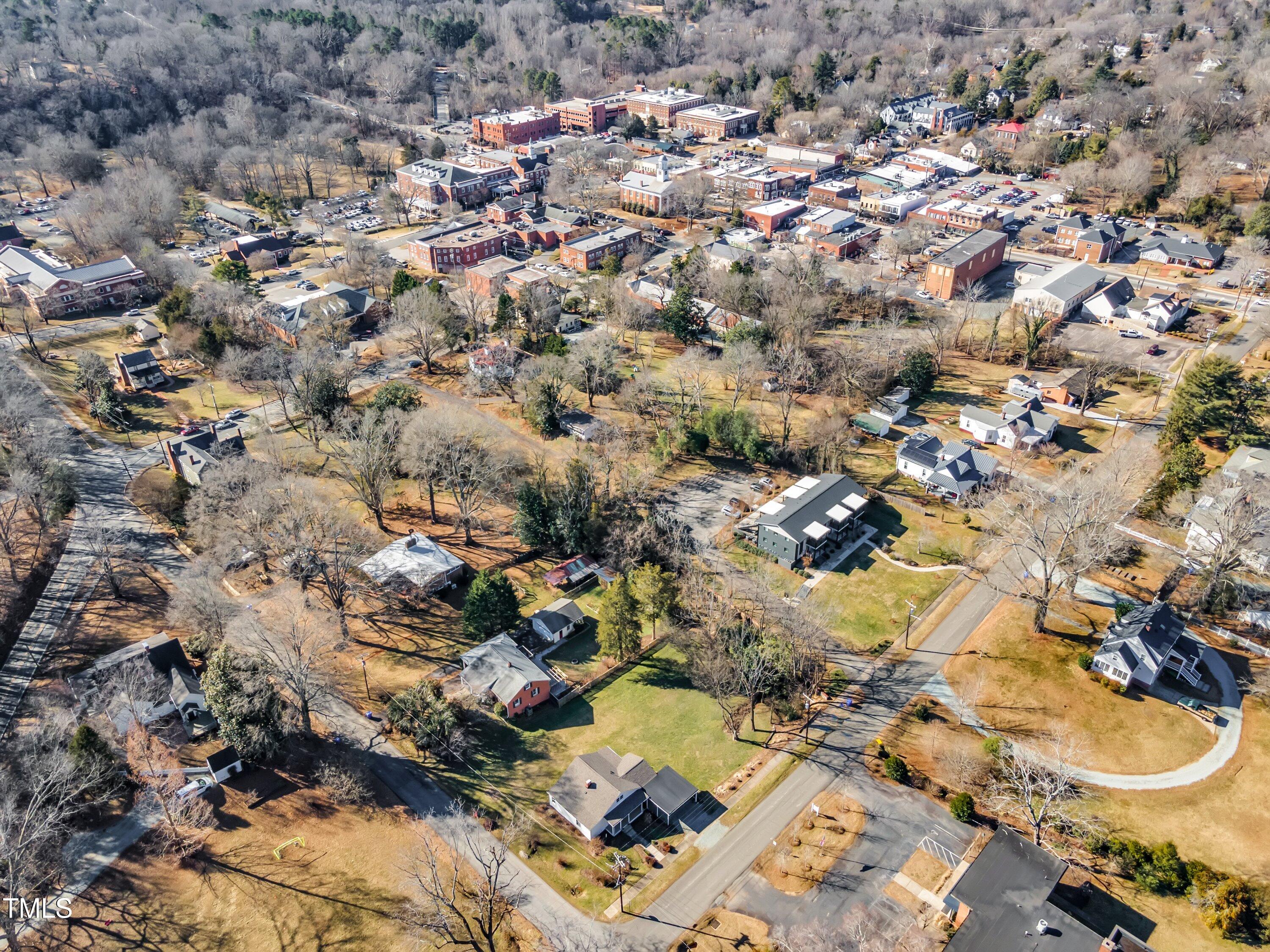 152 East Tryon Street Hillsborough, NC 27278 - Photo 33 of 34 an aerial view of residential houses with outdoor space