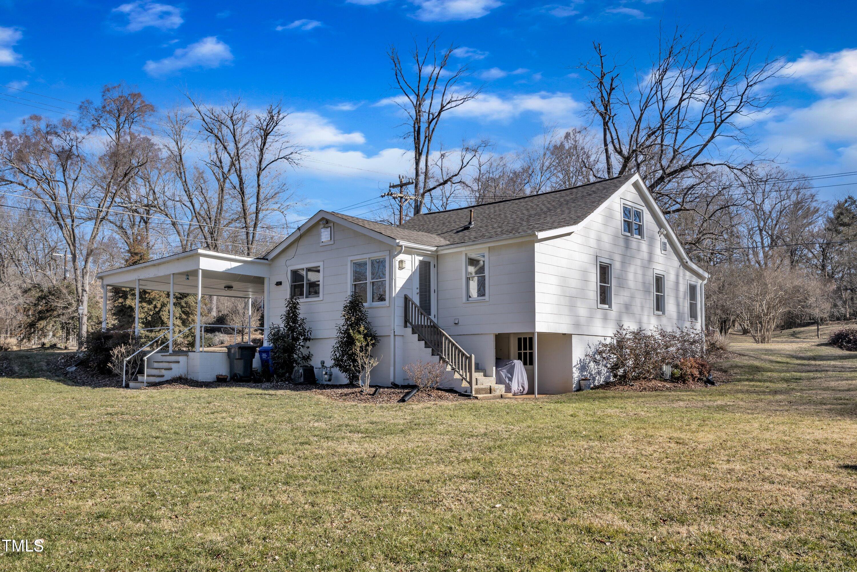 152 East Tryon Street Hillsborough, NC 27278 - Photo 3 of 34 a view of a house with a yard