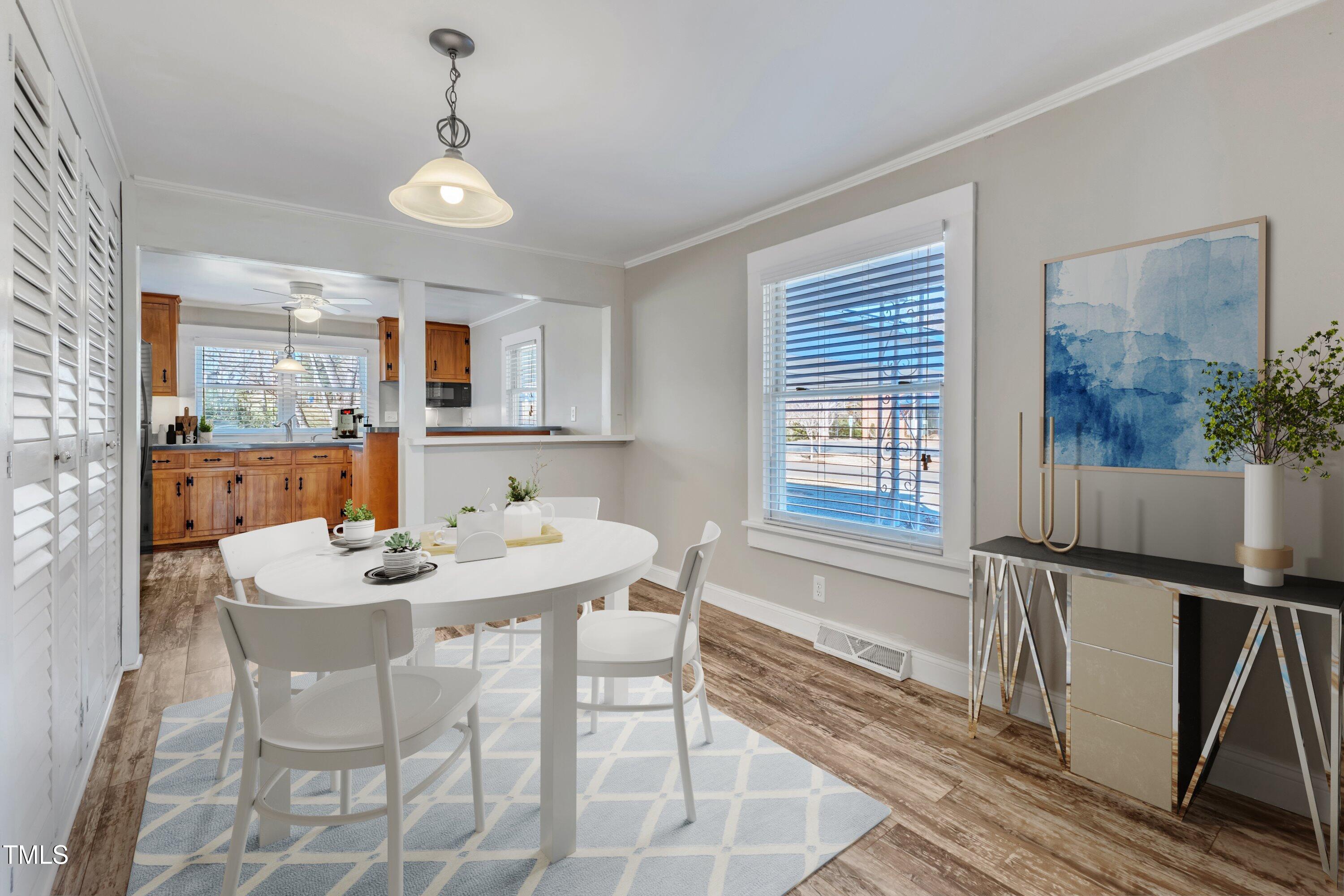 152 East Tryon Street Hillsborough, NC 27278 - Photo 7 of 34 a dining room with furniture and window