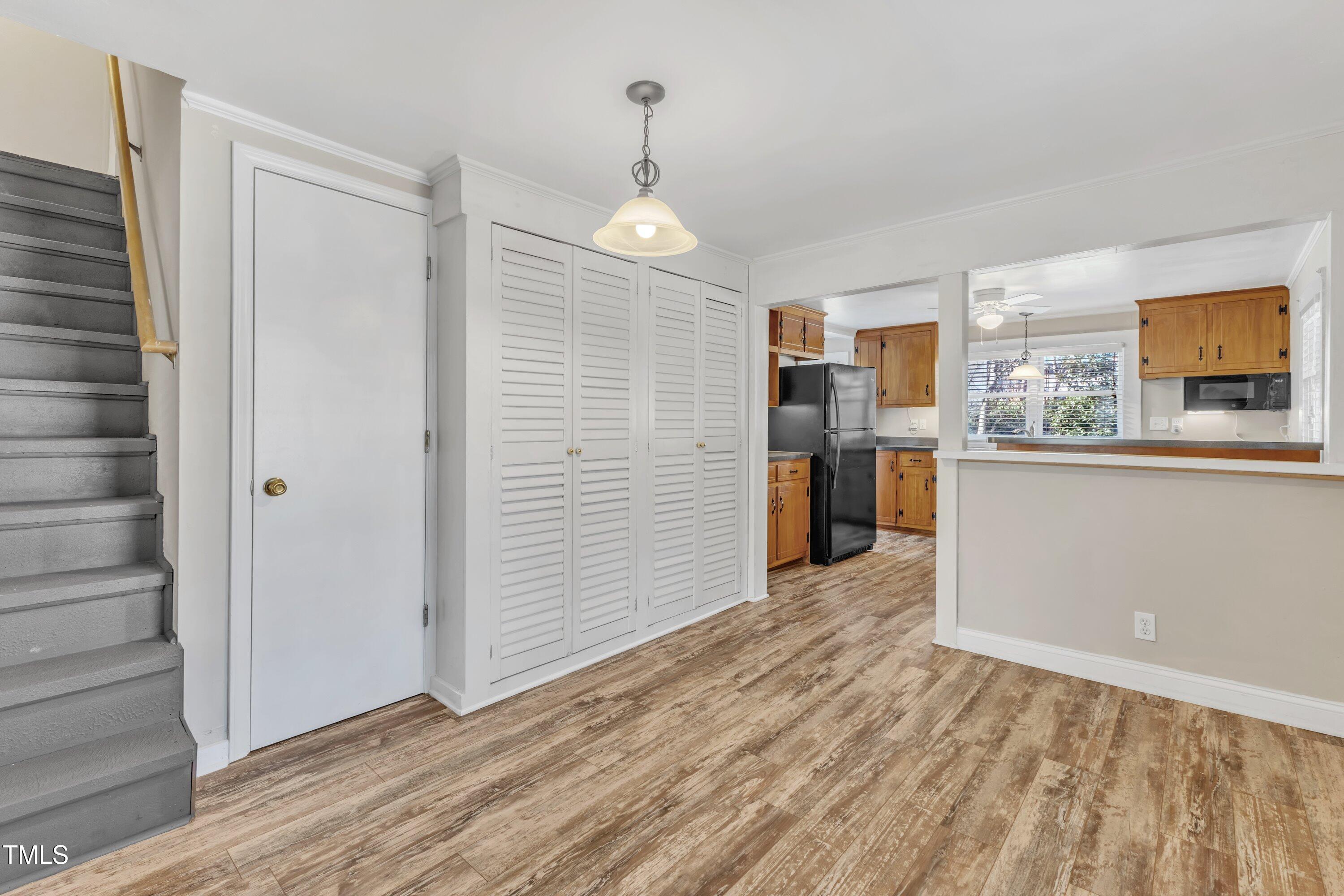 152 East Tryon Street Hillsborough, NC 27278 - Photo 8 of 34 a view of a kitchen from the hallway