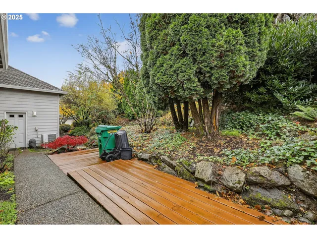 a backyard of a house with outdoor seating