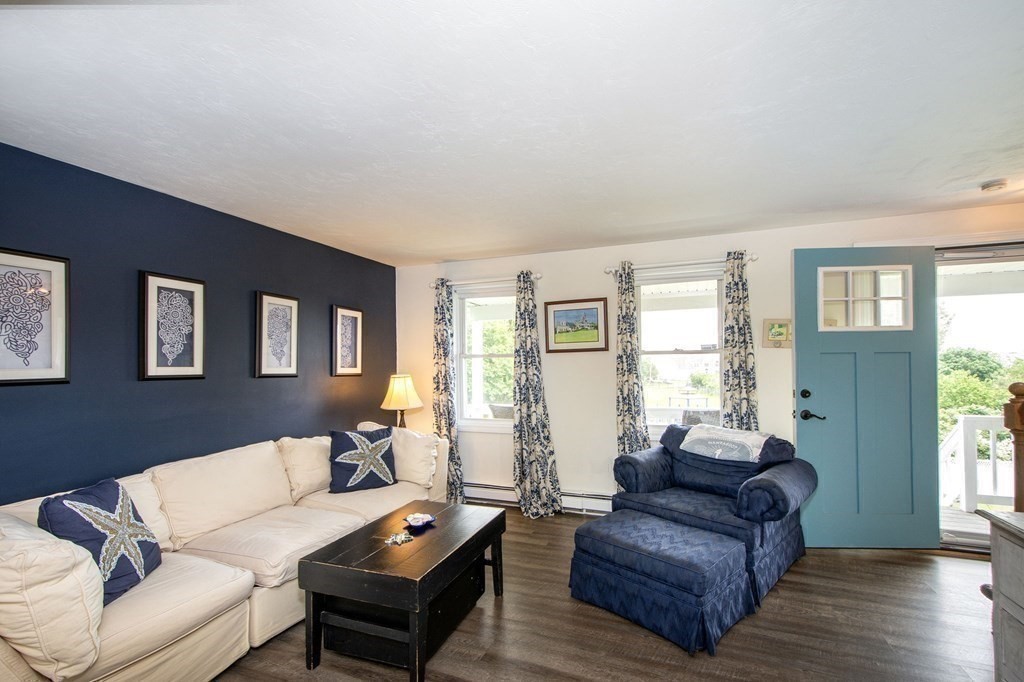 3 Battery Road Hull, MA 02045 - Photo 12 of 42 a living room with furniture and a window