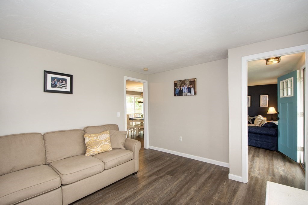 3 Battery Road Hull, MA 02045 - Photo 18 of 42 a living room with furniture and a wooden floor