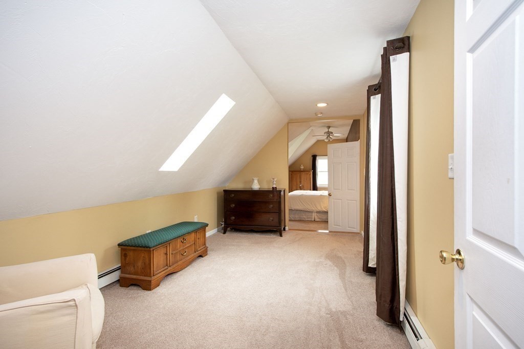 3 Battery Road Hull, MA 02045 - Photo 24 of 42 a living room with furniture and a rug