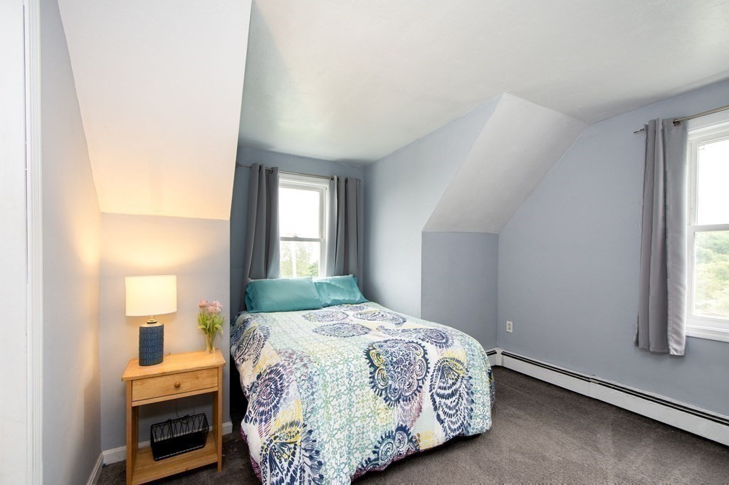 3 Battery Road Hull, MA 02045 - Photo 29 of 42 a bedroom with a bed and a window