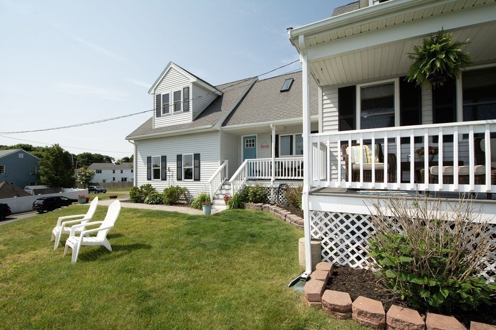 3 Battery Road Hull, MA 02045 - Photo 3 of 42 a view of a house with backyard and sitting area