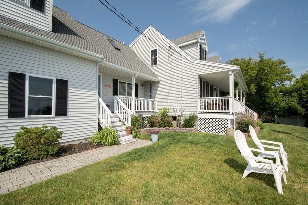 3 Battery Road Hull, MA 02045 - Photo 33 of 42 a front view of a house with garden