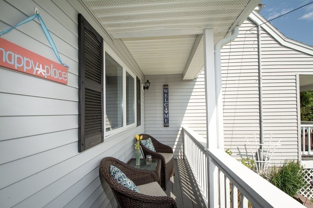 3 Battery Road Hull, MA 02045 - Photo 35 of 42 a view of a chair and tables in the balcony