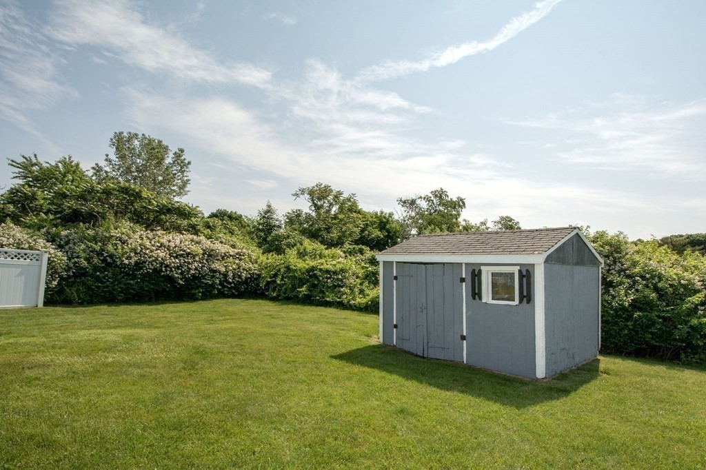 3 Battery Road Hull, MA 02045 - Photo 38 of 42 a view of a house with backyard and garden