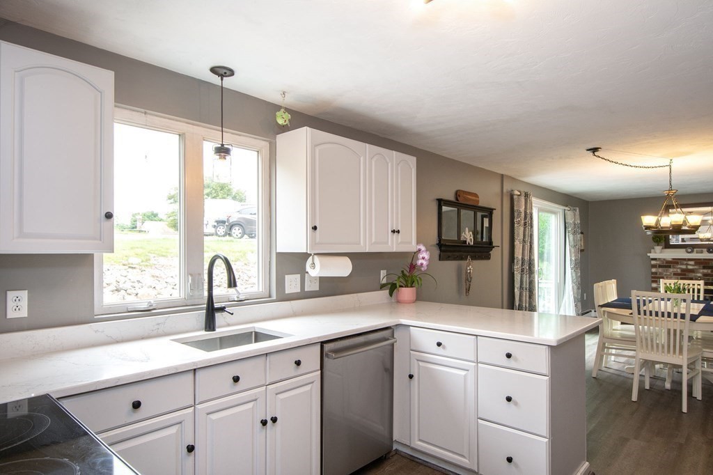 3 Battery Road Hull, MA 02045 - Photo 5 of 42 a kitchen with sink cabinets and window