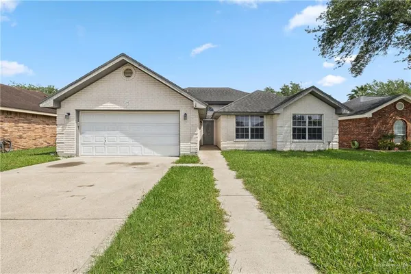 a stove top oven sitting inside of a kitchen