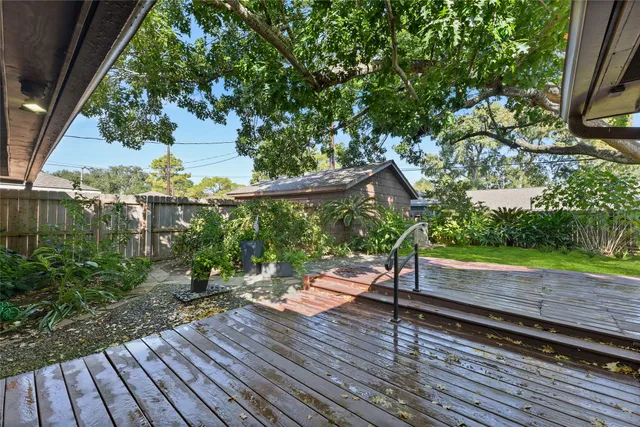 a backyard of a house with seating space
