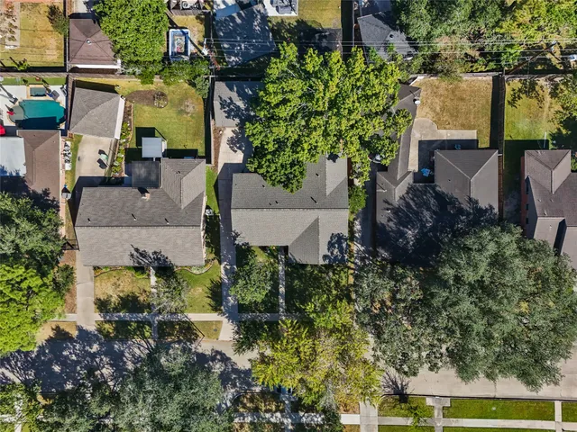 an aerial view of house with yard