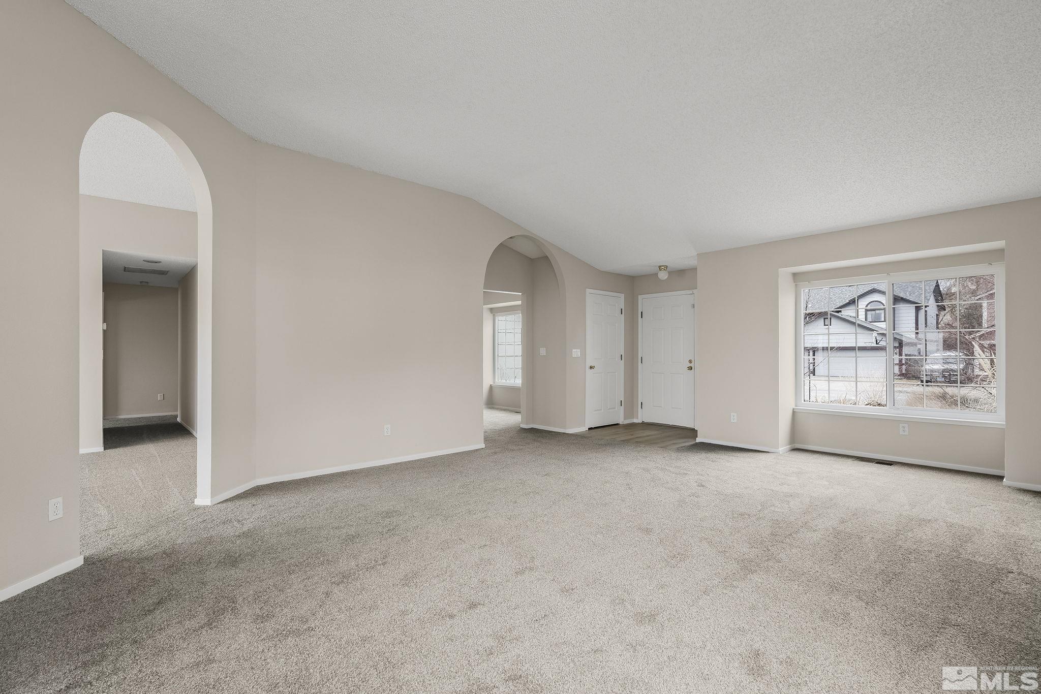 5267 Simons Drive Reno, NV 89523 - Photo 12 of 33 an empty room with windows and closet
