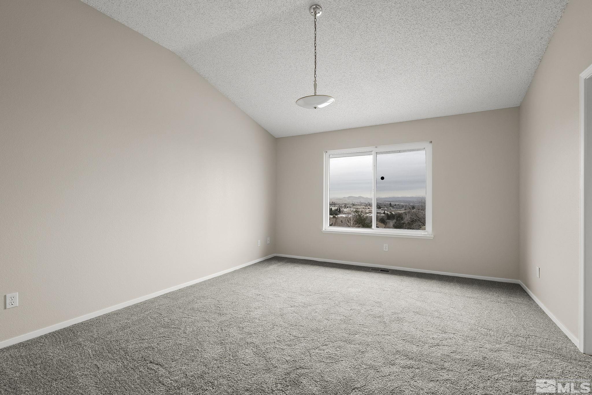 5267 Simons Drive Reno, NV 89523 - Photo 16 of 33 an empty room with a window