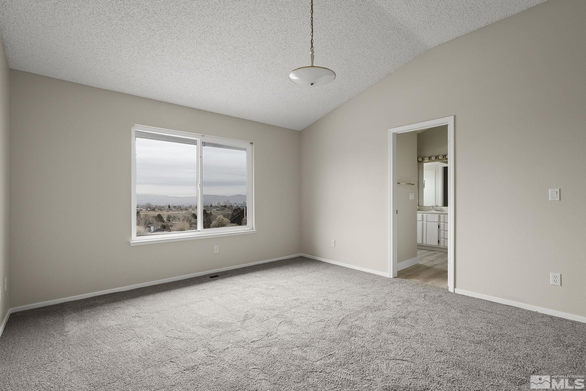 5267 Simons Drive Reno, NV 89523 - Photo 17 of 33 a view of an empty room with a window
