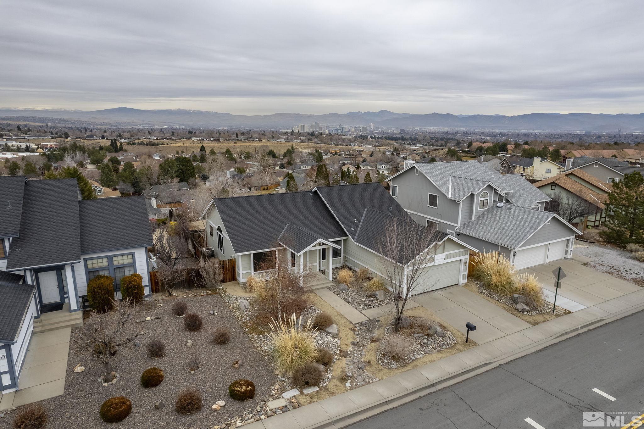 5267 Simons Drive Reno, NV 89523 - Photo 2 of 33 an aerial view of residential houses with outdoor space