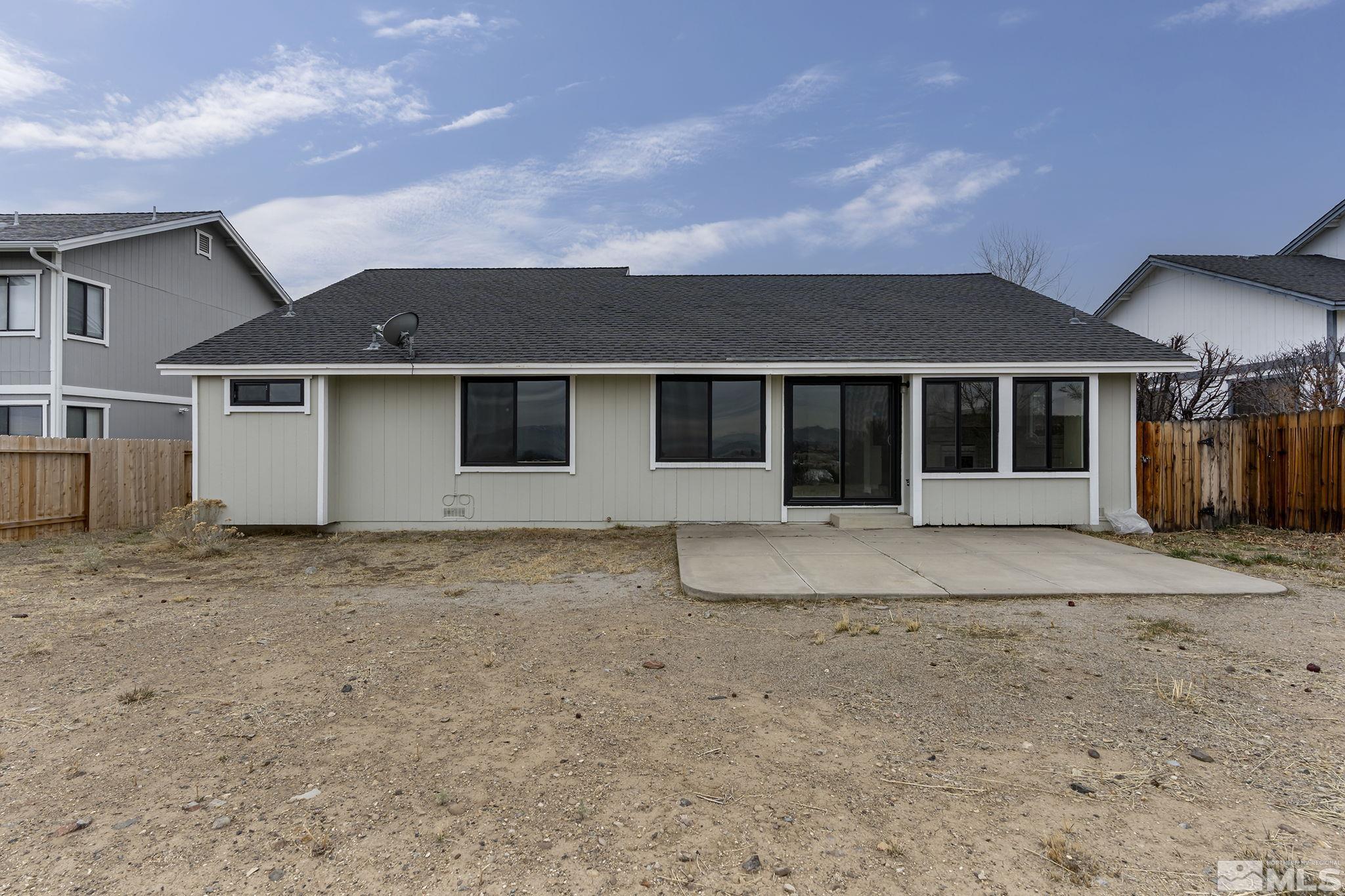 5267 Simons Drive Reno, NV 89523 - Photo 23 of 33 front view of a house with a dry yard