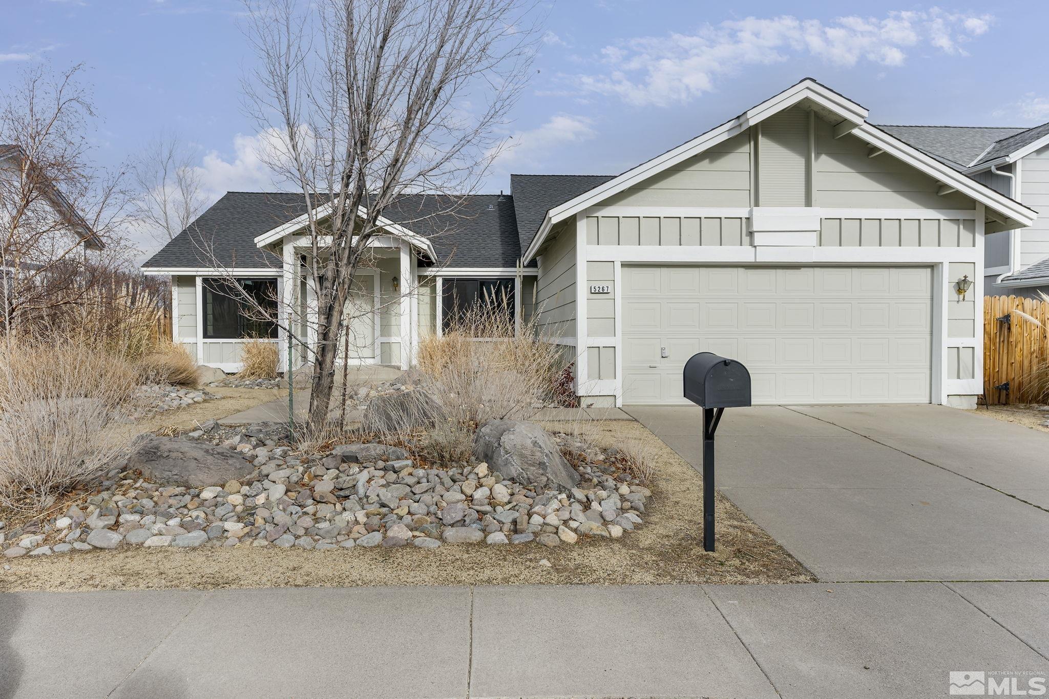 5267 Simons Drive Reno, NV 89523 - Photo 24 of 33 a front view of a house with garden