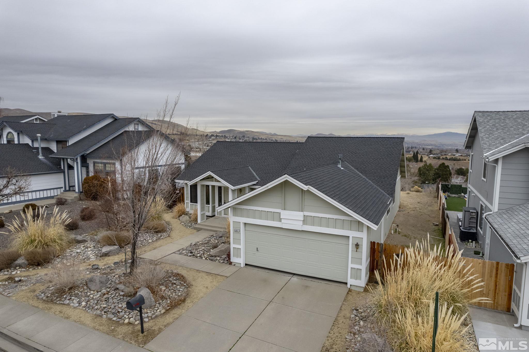 5267 Simons Drive Reno, NV 89523 - Photo 27 of 33 a front view of a house with a yard