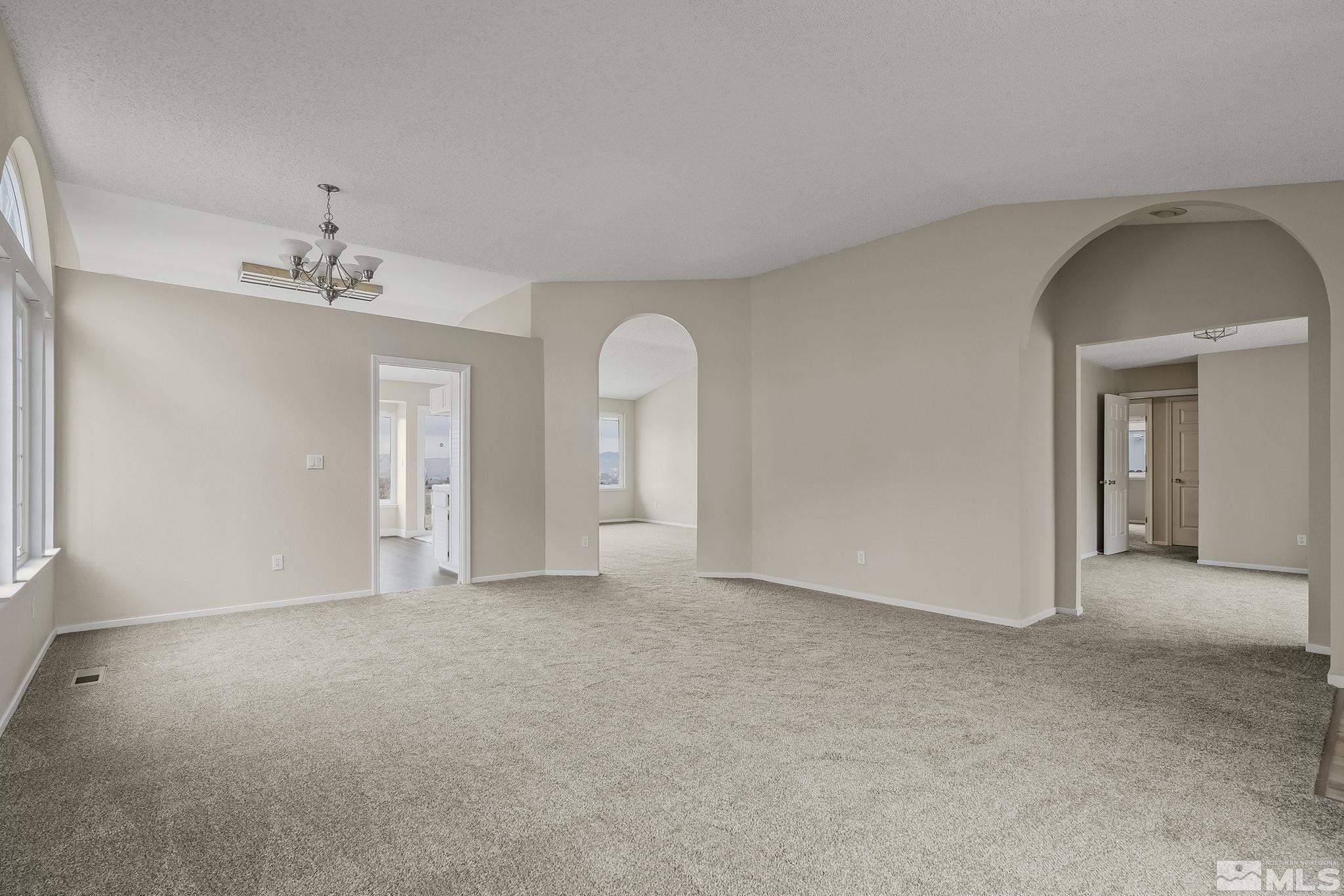 5267 Simons Drive Reno, NV 89523 - Photo 5 of 33 a view of an empty room with a window
