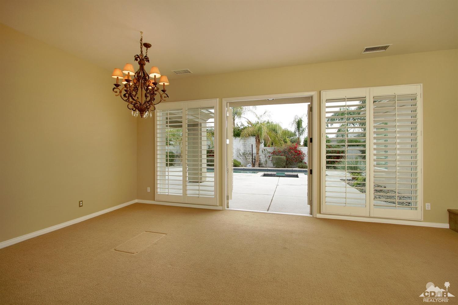 4 Orleans Road Rancho Mirage, CA 92270 - Photo 11 of 35 a view of a room with a large window