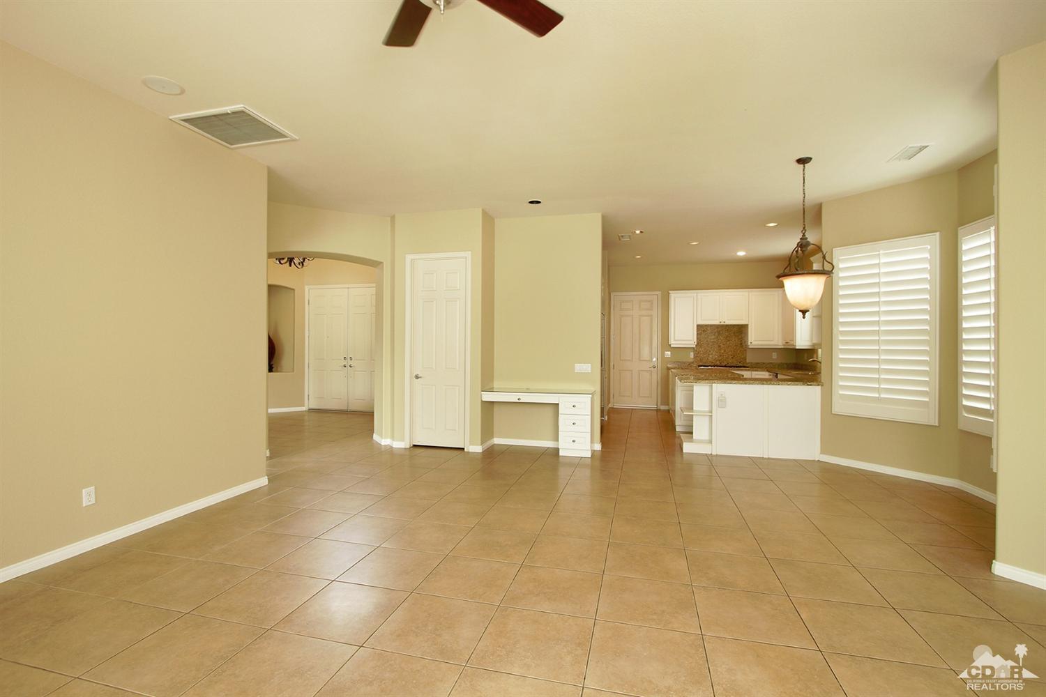 4 Orleans Road Rancho Mirage, CA 92270 - Photo 13 of 35 a view of a kitchen with a sink and a window