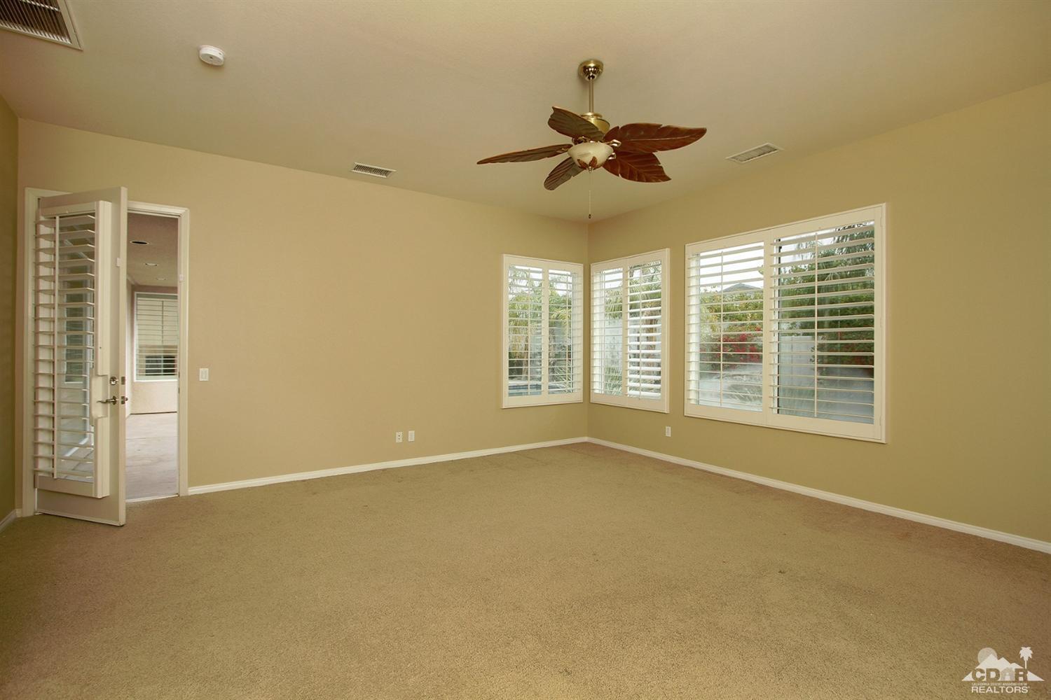 4 Orleans Road Rancho Mirage, CA 92270 - Photo 18 of 35 a view of an empty room with a window