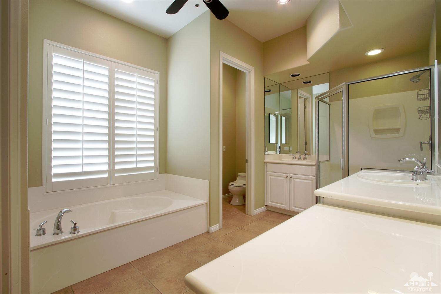 4 Orleans Road Rancho Mirage, CA 92270 - Photo 21 of 35 a spacious bathroom with sink shower and bathtub