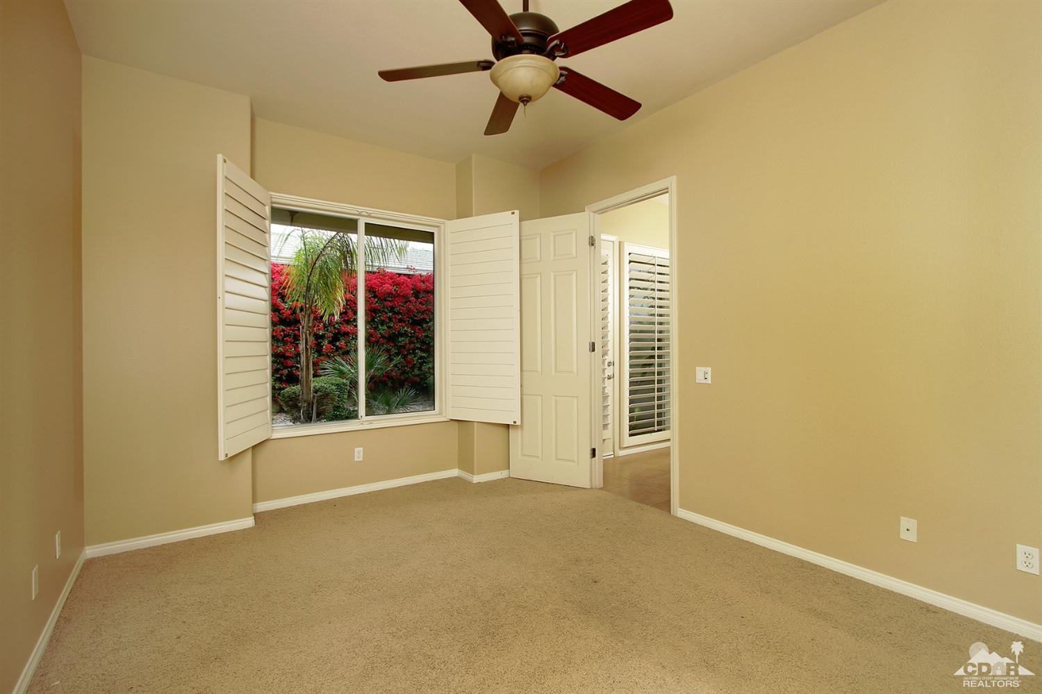 4 Orleans Road Rancho Mirage, CA 92270 - Photo 22 of 35 a view of an empty room with a window