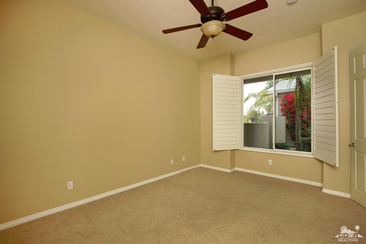 4 Orleans Road Rancho Mirage, CA 92270 - Photo 23 of 35 a view of an empty room with a window
