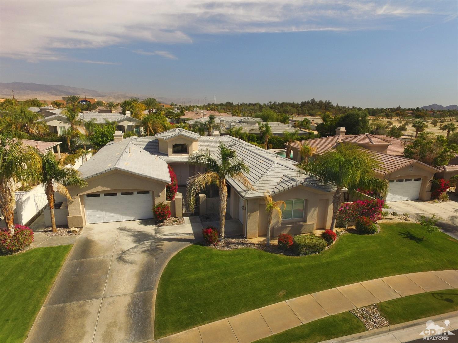 4 Orleans Road Rancho Mirage, CA 92270 - Photo 31 of 35 an aerial view of a house with a garden