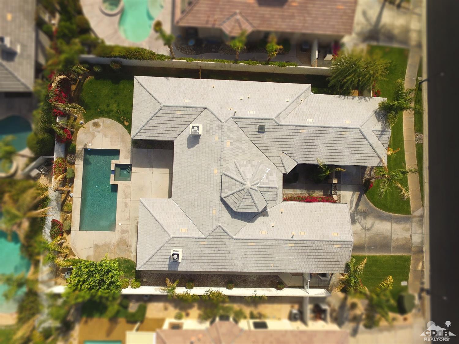 4 Orleans Road Rancho Mirage, CA 92270 - Photo 34 of 35 a aerial view of a house with a yard