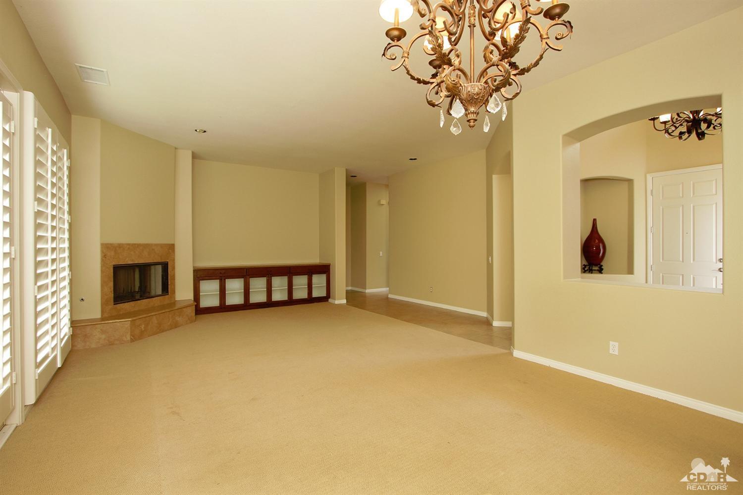 4 Orleans Road Rancho Mirage, CA 92270 - Photo 10 of 35 a view of entryway with chandelier
