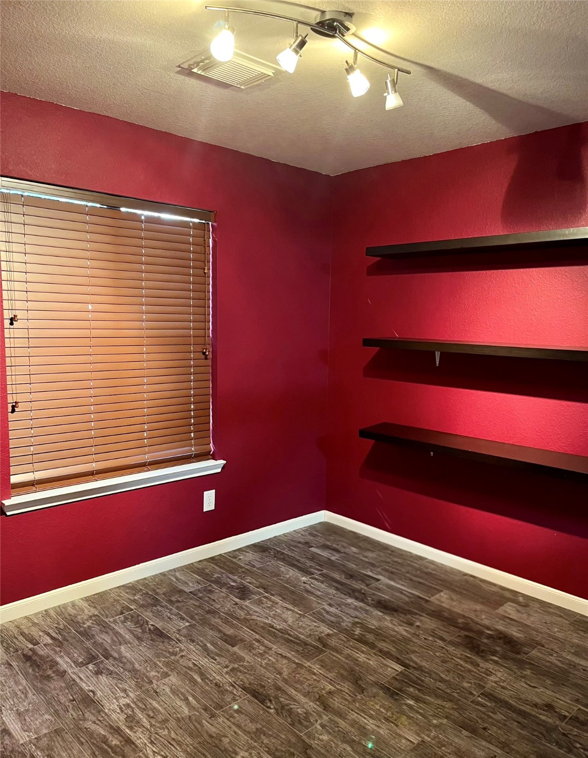 2655 Skyview Shadows Court Houston, TX 77047 - Photo 6 of 9 a bedroom with a bed and a window