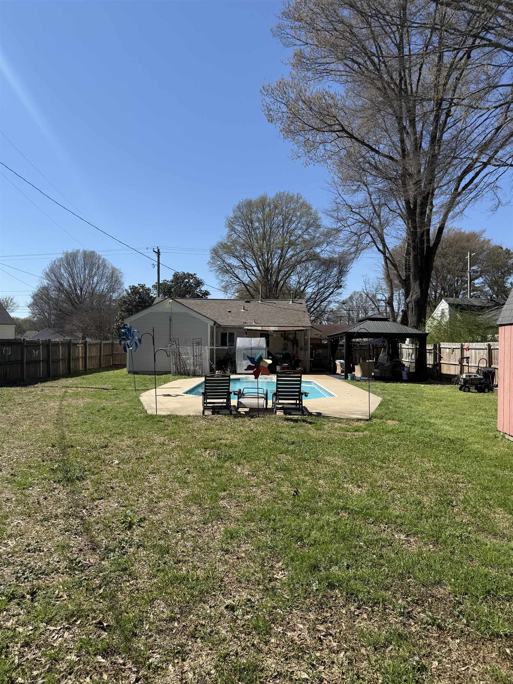 1332 Wells Station Road Memphis, TN 38108 - Photo 15 of 23 Fenced backyard with a patio area