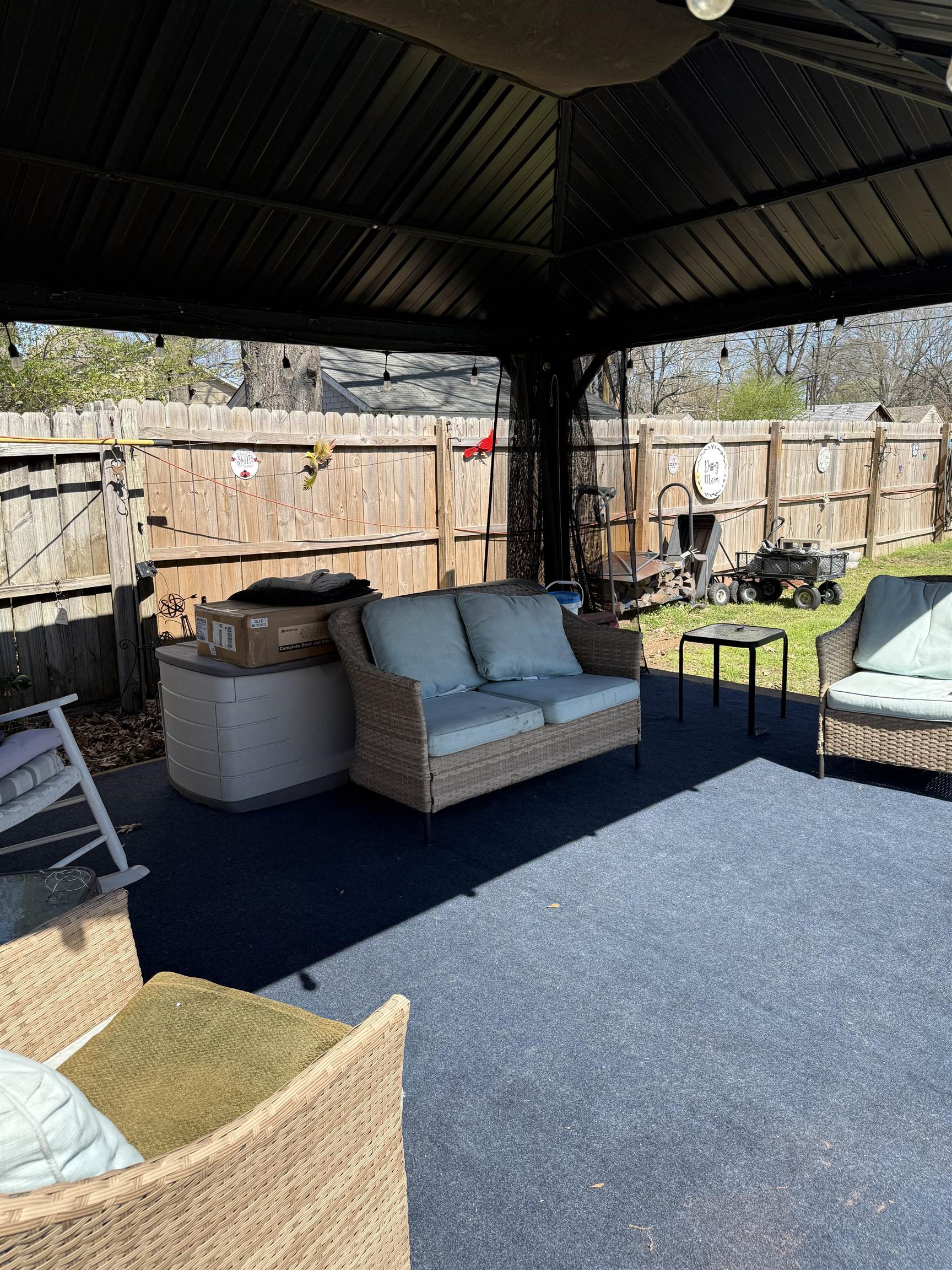 1332 Wells Station Road Memphis, TN 38108 - Photo 17 of 23 Fenced backyard with a patio area and an outdoor hangout area