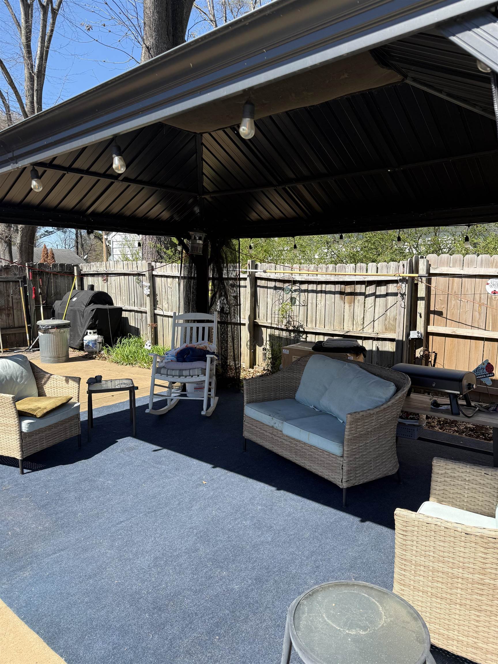 1332 Wells Station Road Memphis, TN 38108 - Photo 18 of 23 Fenced backyard with a grill, outdoor furniture, and a patio