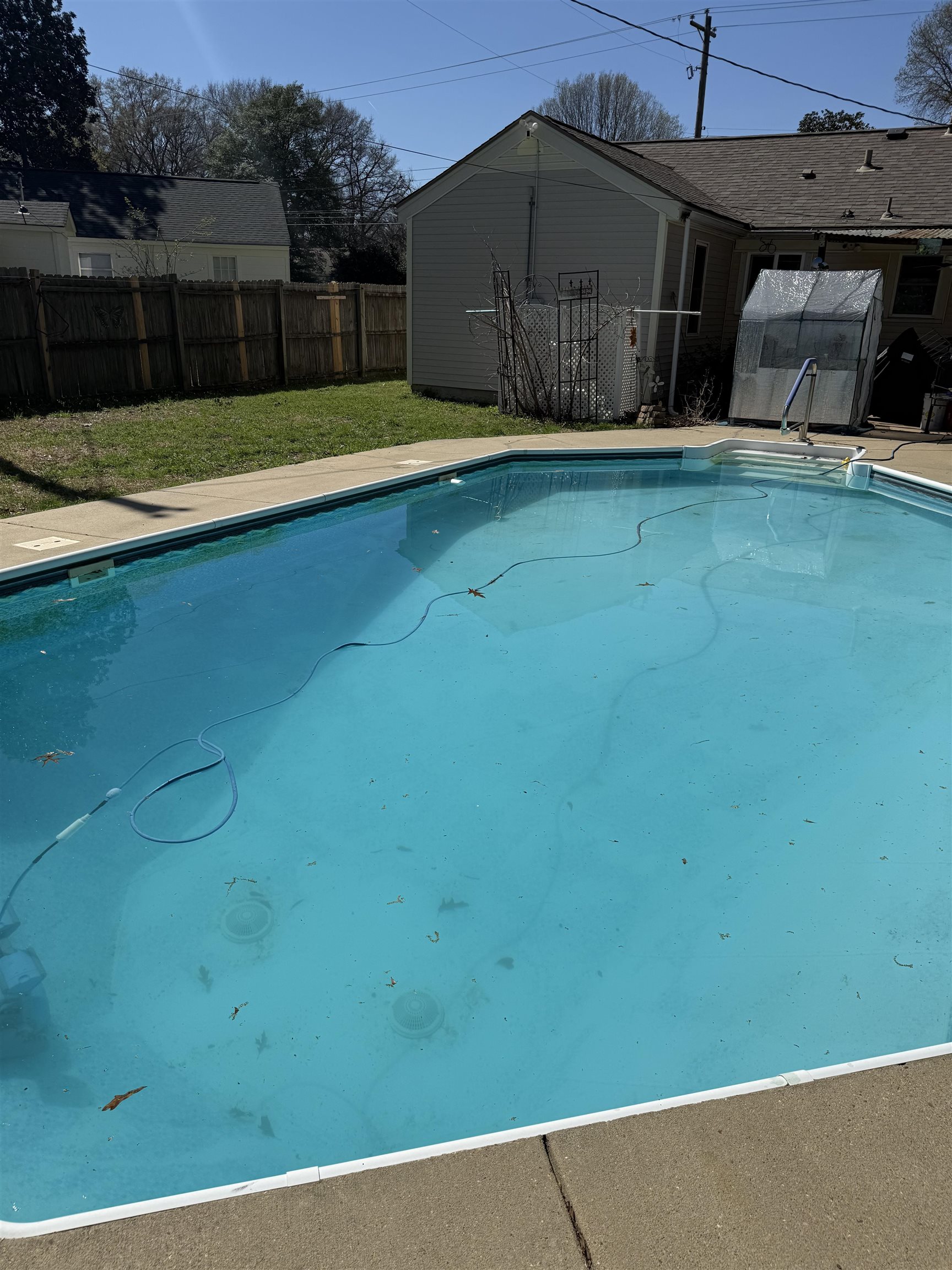 1332 Wells Station Road Memphis, TN 38108 - Photo 20 of 23 View of swimming pool featuring a fenced backyard and patio surround