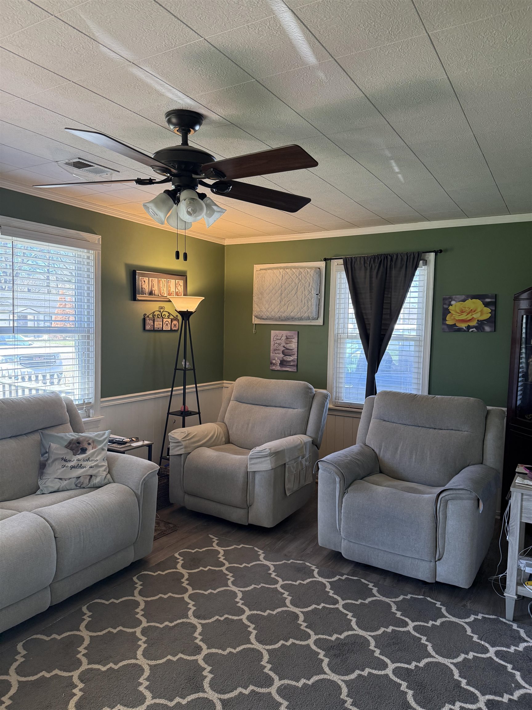 1332 Wells Station Road Memphis, TN 38108 - Photo 3 of 23 Living area featuring ornamental molding, wood finished floors, and ceiling fan