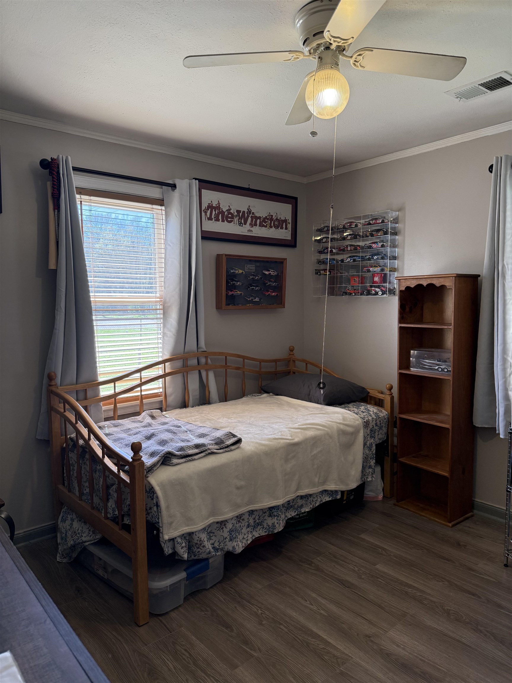 1332 Wells Station Road Memphis, TN 38108 - Photo 8 of 23 Bedroom featuring wood finished floors, ornamental molding, and a ceiling fan