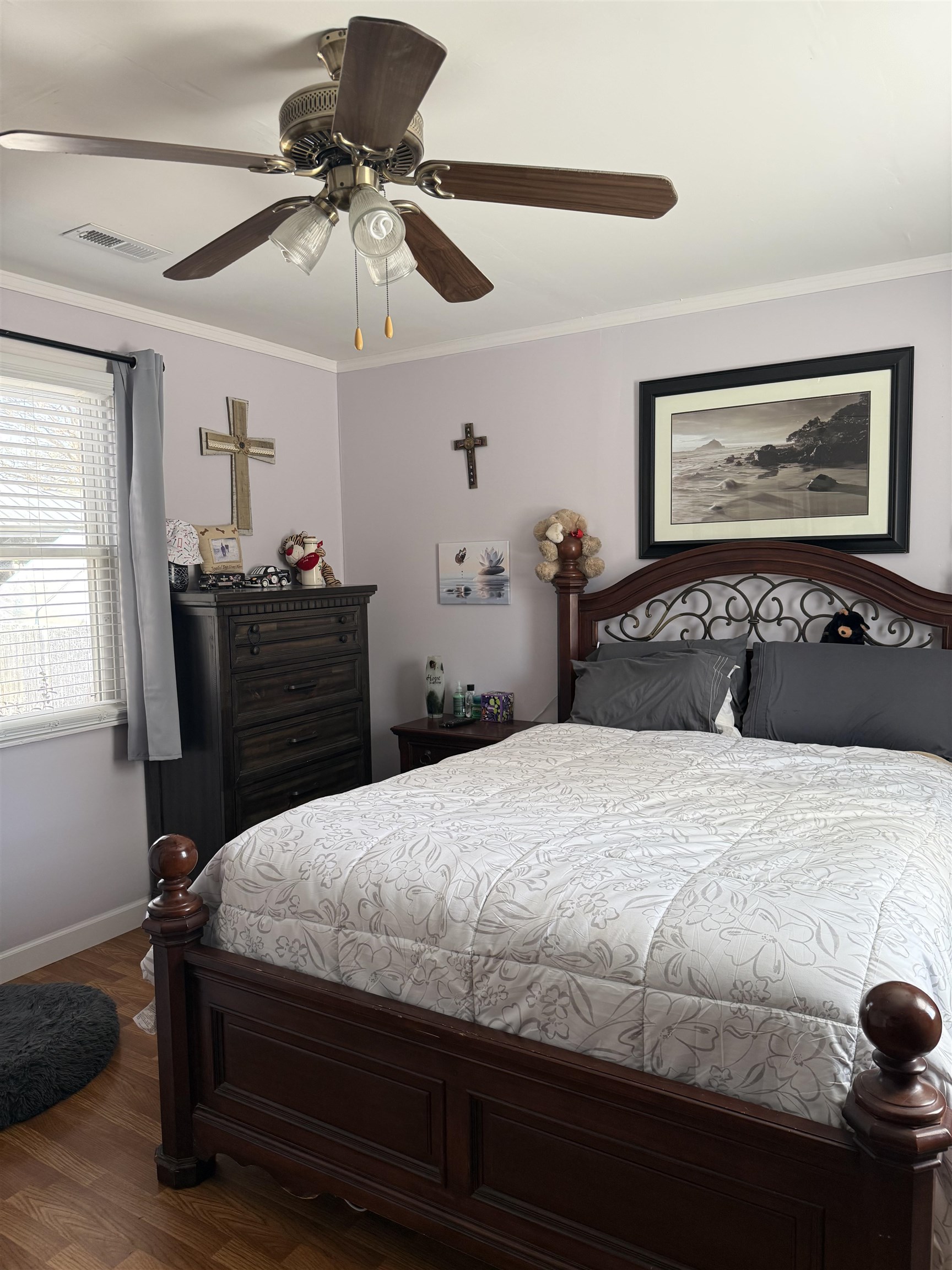 1332 Wells Station Road Memphis, TN 38108 - Photo 10 of 23 Bedroom with crown molding, dark wood-type flooring, and ceiling fan