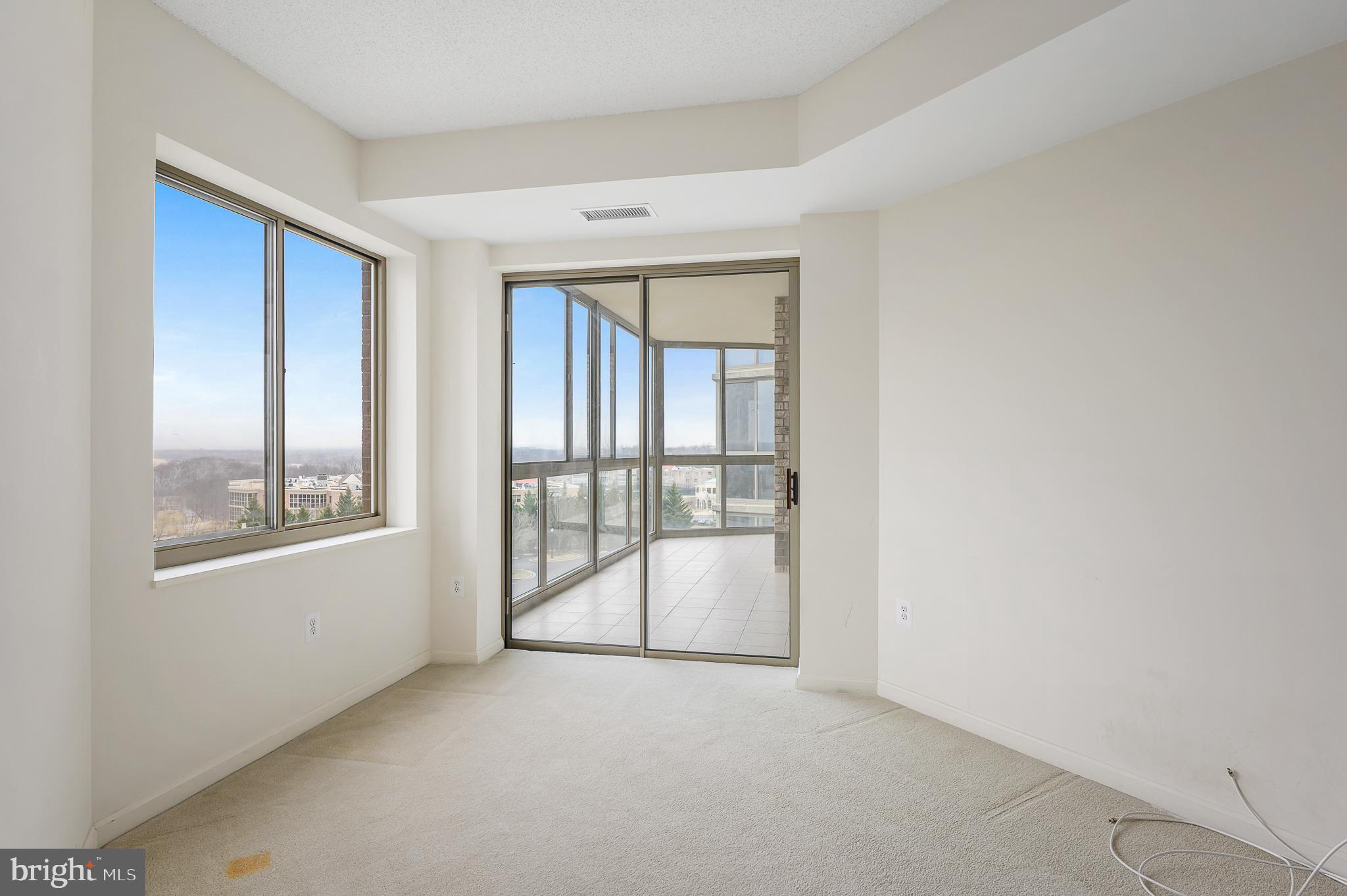 19355 Cypress Ridge Terrace, Unit 515 Leesburg, VA 20176 - Photo 14 of 33 2nd bedroom opens to sunroom